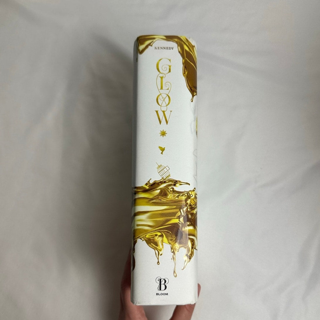 Glow by Raven Kennedy | Deluxe Digitally Signed Sprayed Edges Hardcover