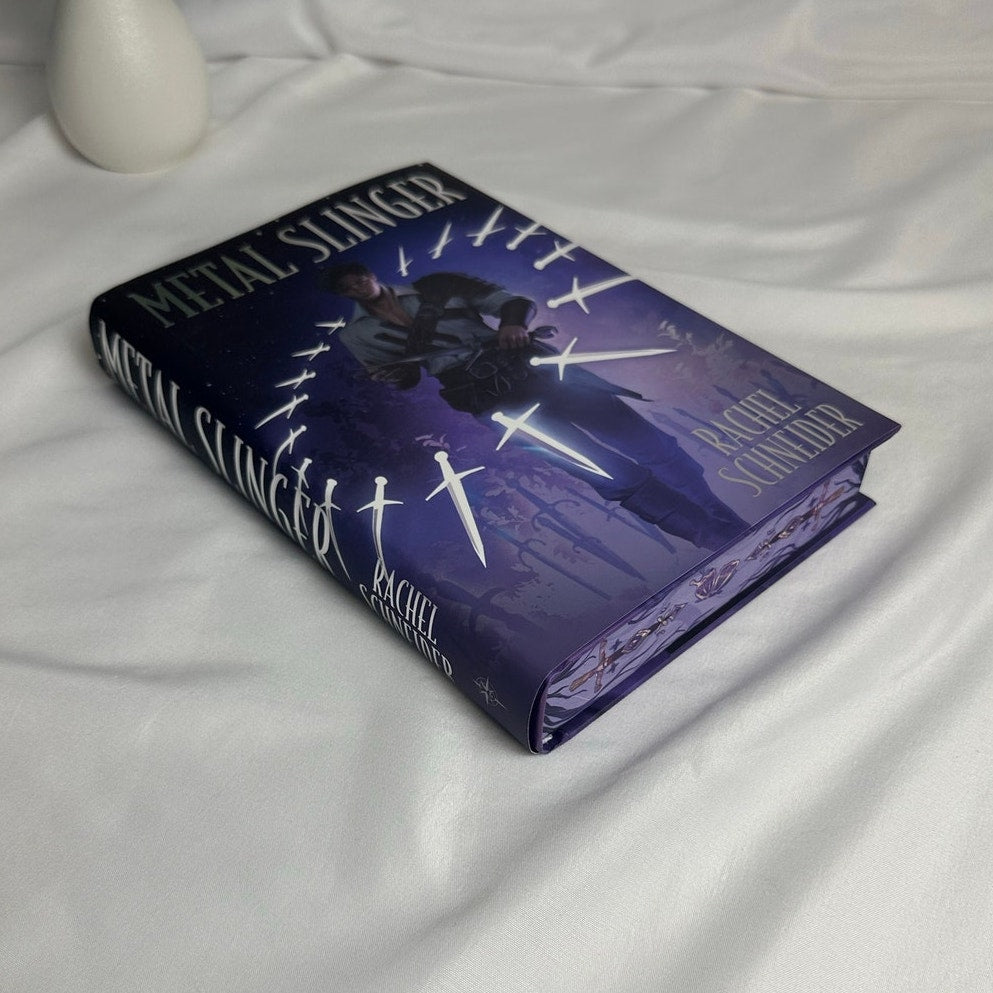 Metal Slinger by Rachel Schneider | FairyLoot Digitally Signed Special Edition Hardcover