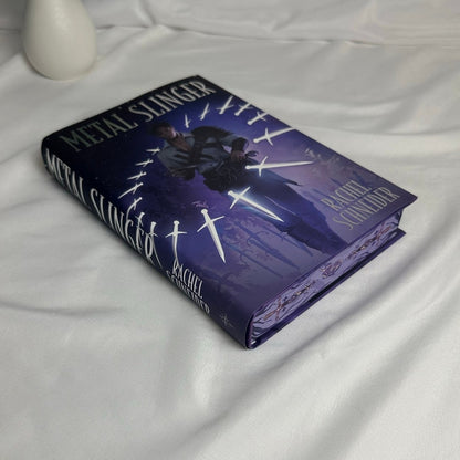 Metal Slinger by Rachel Schneider | FairyLoot Digitally Signed Special Edition Hardcover