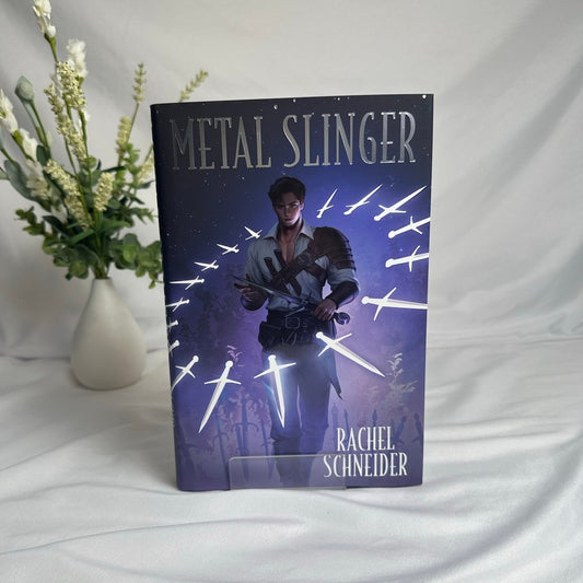 Metal Slinger by Rachel Schneider | FairyLoot Digitally Signed Special Edition Hardcover